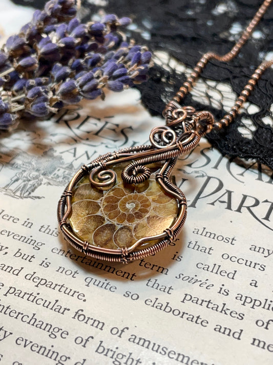 Ammonite Fossil Pendant woven in Copper
