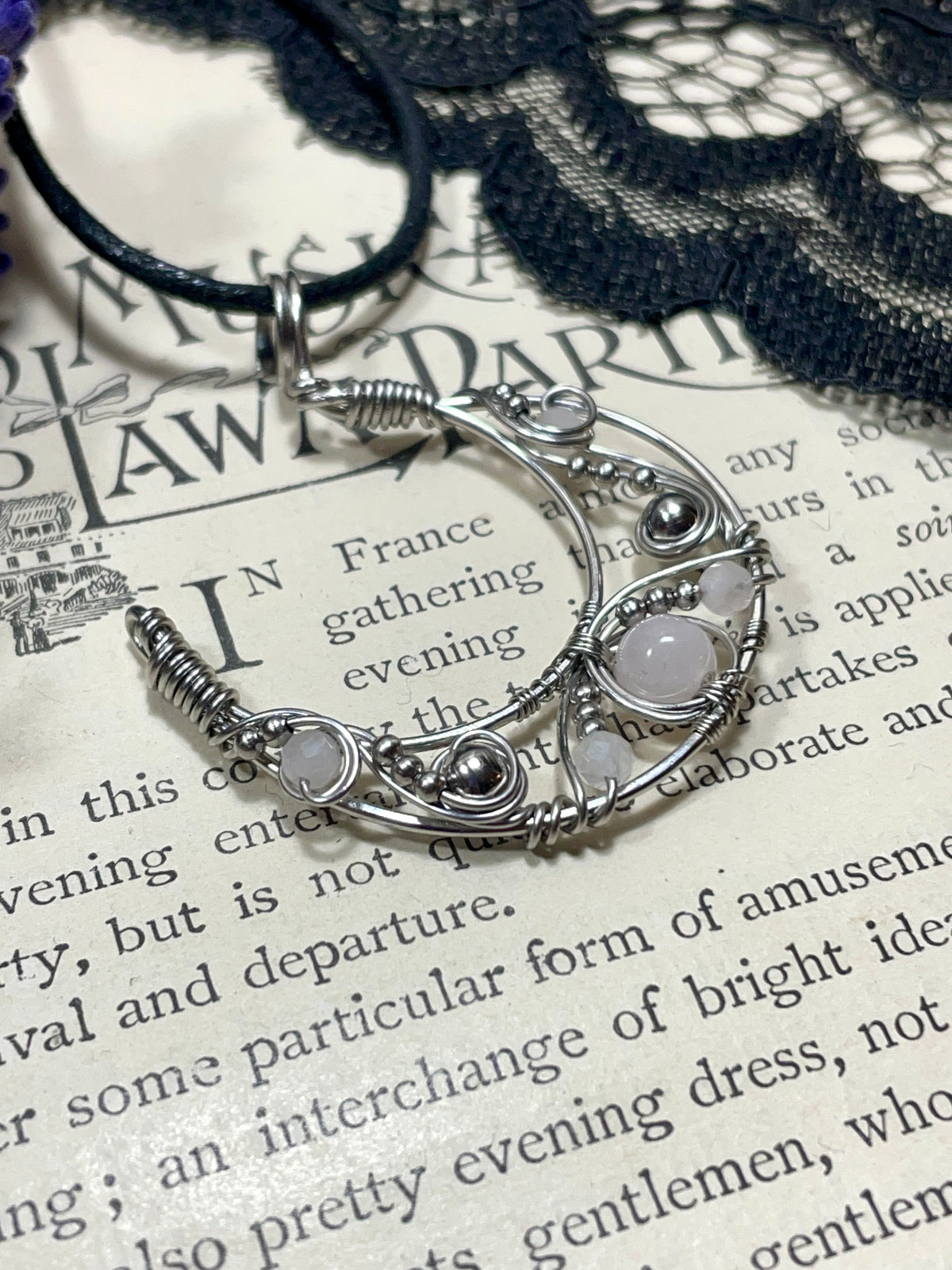 Rose Quartz Crescent Moon Pendant in Stainless Steel